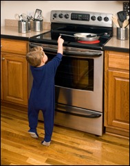 Toddler reaching for a hot stove