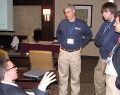 Karim and Rob listening to customers at User Conference Lab